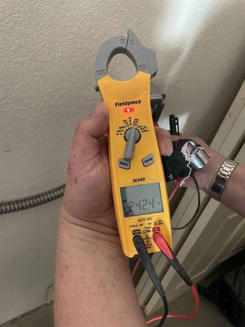 Voltage testing with clamp meter during Aluminum Wiring Replacement in Raleigh